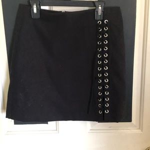 black skirt with tie on the side